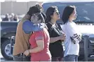  ?? GETTY IMAGES ?? Families gather in a Walmart lot Monday in Duncan, Okla.