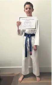  ??  ?? Well done Luca Gasparini with his certificat­e at under eights level
