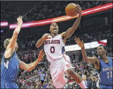  ?? CURTIS COMPTON / CCOMPTON@AJC.COM ?? The Atlanta Hawks, including guard Jeff Teague (0), had a 19-game winning streak and the best overall NBA record at the end of January.