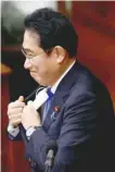  ?? Reuters ?? Japan’s Prime Minister Fumio Kishida prepares to deliver his policy speech during the first day of an ordinary session at the lower house of parliament in Tokyo, Japan, on Monday. —