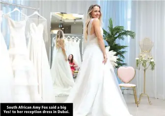  ?? ?? South African Amy Fox said a big Yes! to her reception dress in Dubai.