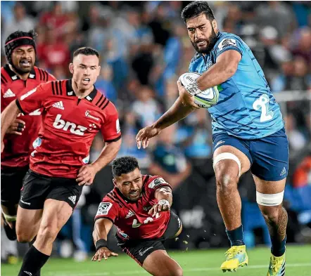  ?? PHOTOSPORT ?? Akira Ioane fends off Richie Mo’unga on his way to the try-line on Saturday.