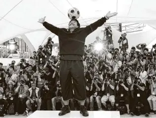  ?? Matt Sayles / Associated Press ?? Seldom far from the spotlight, Diego Maradona poses during a media event for the documentar­y “Maradona” at Cannes, France, in 2008. Maradona died of a heart attack on Wednesday.