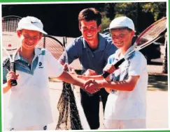  ??  ?? 1996: Andy (left) on court with mum Judy and brother Jamie