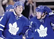  ?? FRANK GUNN/THE CANADIAN PRESS ?? Auston Matthews, Morgan Rielly and the Maple Leafs have come a long way to earn a shot at the mighty Caps.