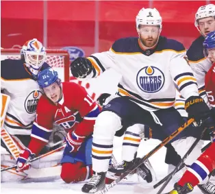  ?? ALLEN MCINNIS FILE ?? Oilers goaltender Mikko Koskinen, defenceman Adam Larsson and the rest of the lineup will remain intact for the rest of the season after the team made just one small move at the trade deadline, acquiring veteran second pairing defenceman Dmitry Kulikov.