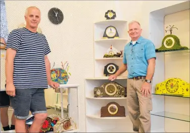  ?? PICTURE / PAUL BROOKS ?? Steve Selfe (right) and Peter Shepherd with a selection of clocks in their It’s About Time exhibition.