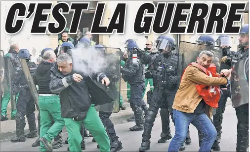  ?? ?? CLASH: Cops armed with tear gas and stun grenades repel French protesters enraged over retirement-age changes.