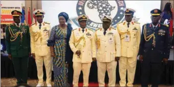  ?? ?? The Chief of the Naval Staff, Vice Admiral Awwal Zubairu Gambo (CFR) and wife, NOWA National President, Hajia Aisha Nana Gambo, flanked by some senior naval officers; Major General Victor Okwudili Ezegwu, Commander of the Infantry Corps of the Nigerian Army; and Air Vice Marshal NE Calmday, Chief of Administra­tion, Nigerian Air Force
