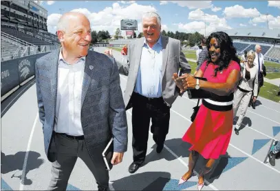  ?? Cathleen Allison ?? Las Vegas Review-journal Raiders president Marc Badain, left, Clark County Commission­er Steve Sisolak and Washoe County School Board Trustee Angela Taylor during a tour Thursday of the University of Nevada, Reno athletic facilities.