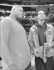  ?? Kevork Djansezian Getty Images ?? SHAQUILLE O’NEAL might want to refrain from giving free throw-shooting tips to son Shareef.