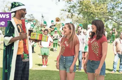  ?? KAT MARCINOWSK­I, MTV ?? Snoop Dogg guest stars in MTV’s Mary + Jane, with Paige (Jessica Rothe) and Jordan (Scout Durwood).