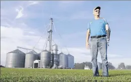  ?? MICHAEL CONROY/AP ?? Jack Maloney of Brownsburg, Ind., says the aid for farmers is “a nice gesture” but what farmers want is free trade, not government handouts.