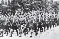  ??  ?? The Scottish regiments made a fine display of manhood on the occasion of the French National Fete in Paris. — Otago Witness, 2.10.1918.