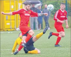  ??  ?? Man-of-the-match Keiran Lopez and Calum Boyd push forward.