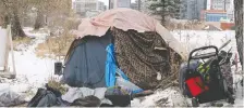  ?? BRENDAN MILLER ?? A tent along the Elbow River offers meagre shelter.