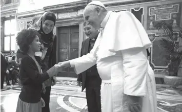  ?? ASSOCIATED PRESS ?? Pope Francis meets members of the Pontifical Institute of Arab and Islamist Studies, at the Vatican.