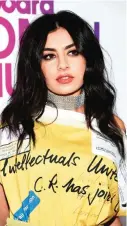  ??  ?? Charli XCX attends the 11th annual Billboard Women in Music honors at Pier 36 on Friday, Dec. 9, 2016, in New York.