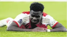  ?? ?? Das heutige Spitzenspi­el in der Premiere League: FC Liverpool gegen FC Arsenal mit Bukayo Saka (ab 18.00 Uhr auf Sky)