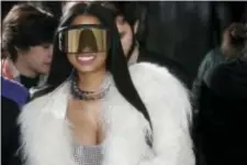  ?? THIBAULT CAMUS ‑ THE ASSOCIATED PRESS ?? In this March 2 photo, singer Nicki Minaj attends Rick Owens’ Fall‑Winter 2017‑2018 ready to wear fashion collection presented in Paris. Celebritie­s, including Minaj and Alanis Morissette are among the victims of what police suspect is “flocking,” so...