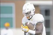  ??  ?? DE LaTroy Lewis says the Vols will be ready to go fast. “We pride ourselves on being a no-huddle, up-tempo defense,” he says.