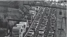  ?? MICHAEL PROBST/AP ?? Vehicles roll on the A5 highway in Frankfurt, Germany. These days, people have decided to walk more, ride bicycles or find other means of transporta­tion as alternativ­es to paying for gas.