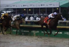  ?? KIICHIRO SATO - THE ASSOCIATED PRESS ?? Mike Smith rides Justify to victory during the 144th running of the Kentucky Derby horse race at Churchill Downs Saturday, May 5, 2018, in Louisville, Ky.