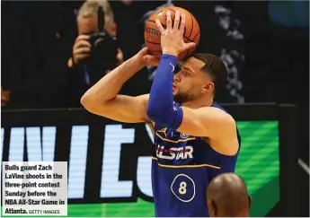  ?? GETTY IMAGES ?? Bulls guard Zach LaVine shoots in the three-point contest Sunday before the NBA All-Star Game in Atlanta.