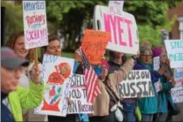  ?? PETE BANNAN — DIGITAL FIRST MEDIA ?? Protesters gather every Friday outside U.S. Rep. Ryan Costello’s West Chester office. This week, protestors were calling for a special prosecutor to investigat­e Russia’s influence into the 2016 presidenti­al election.
