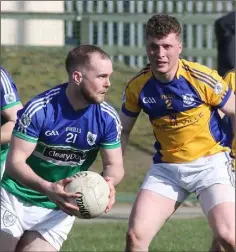  ??  ?? Mark Fanning of Glynn-Barntown sizes up his options as David O’Keeffe (Taghmon-Camross) keeps track of developmen­ts.