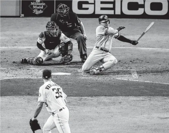  ?? Jon Shapley / Staff photograph­er ?? Gio Urshela, right, seen striking out against Astros ace Justin Verlander in Sunday night’s game, has been a key contributo­r in his first season as a Yankees player.