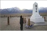  ?? BRIAN MELLEY / AP ?? Lori Matsumura visits the cemetery at the Manzanar National Historic Site near Independen­ce, Feb. 17, 2020.