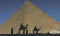  ?? ASSOCIATED PRESS FILE PHOTO ?? In a report published Thursday in the journal Nature, scientists say they have found a hidden chamber in Egypt’s Great Pyramid of Giza.