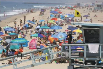  ?? John Antczak / Associated Press 2017 ?? If California’s beaches seem less crowded than in the past, they probably are, as population growth in 2018 was the slowest in state history, slipping to 0.47% last year from 0.78% in 2017.