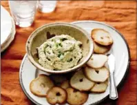  ?? PHOTOS BY RIKKI SNYDER, NYT ?? Smoked-trout spread and bagel chips is a simple savoury creation that keeps guests out of the kitchen while you finish cooking.