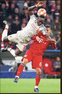  ?? - Reuters ?? The Mane man: Liverpool’s Sadio Mane goes airborne in a duel with Bayern Munich’s Thiago in their Champions League last-16, second leg tie on Wednesday.