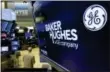  ?? RICHARD DREW — THE ASSOCIATED PRESS ?? The logo for Baker Hughes appears above a trading post on the floor of the New York Stock Exchange, Tuesday.