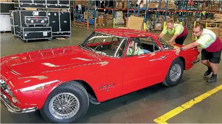  ?? SUPPLIED ?? We at Stuff obtained this photo of the Maserati 5000GT once owned by Joe Walsh being pushed around in its impound.