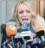  ??  ?? STORMY DANIELS: The adult film actress speaking outside a federal court in New York.