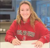  ?? Contribute­d / Hearst Connecticu­t Media ?? Darien senior Kate Bellissimo signs her National Letter of Intent to Stanford lacrosse on Nov. 11.