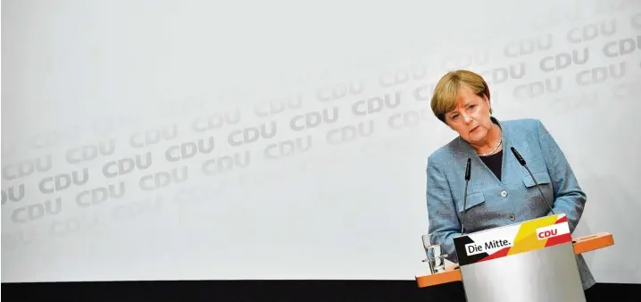  ?? Foto: Tobias Schwarz, afp ?? „Wir haben noch viel Arbeit vor uns“, sagte Bundeskanz­lerin Angela Merkel gestern. Ja, da hat sie wohl recht. Denn jetzt stehen erst einmal schwierige Koalitions­verhandlun­gen über eine mögliche Jamaika Koalition mit den Grünen und der FDP an. Was aus dieser eigenartig­en Gemengelag­e in Berlin herauskomm­t, ist noch unklar.