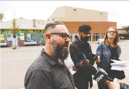  ?? IAN KUCERAK ?? Fringe Theatre executive director Adam Mitchell speaks about the removal of support for the show Who Goes There written by playwright David Belke during a press conference in Edmonton on Friday. Belke was convicted of possession of child pornograph­y in 2017.