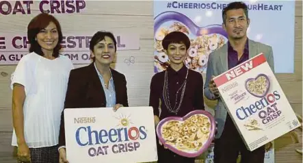  ?? [FOTO SHIRAZ YASMINE ALI/BH] ?? (Dari kiri) Indra, Nirmalah, Atilia dan Yap Lumpur, semalam. pada majlis pelancaran ‘Nestle Cheerios Oat Crisp di Kuala