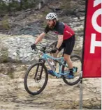  ??  ?? Byron competing on a Specialize­d bike during a leg of the 2017 Toyota Fortuner 4x4 Challenge in Knysna.