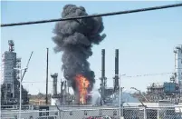  ?? STEPHEN MACGILLIVR­AY THE CANADIAN PRESS ?? At least four people were injured in the Thanksgivi­ng Day explosion at the Irving Oil refinery in Saint John, N.B.