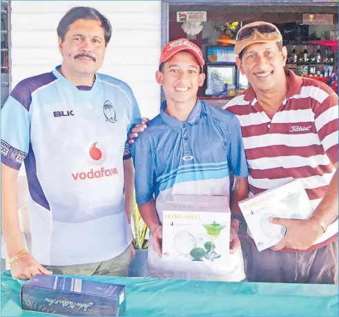  ?? Picture: SUPPLIED ?? Lautoka Golf Club tournament sponsors Sanjay Prasad, left, and Raymond Singh, right, with junior division champion Alex Singh.