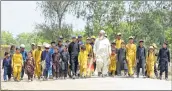  ?? AFP ?? Gulzar Khan (centre) has 36 children from his three wives.