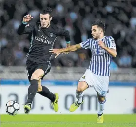  ?? FOTO: GETTY IMAGES ?? Carrera estéril Kevin corrió ante Bale pero no le pudo parar e hizo el 1-3