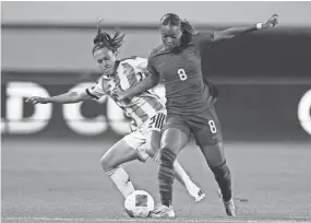  ?? RYAN SUN/AP ?? United States forward Jaedyn Shaw, front, and Argentina defender Eliana Stábile vie for the ball Friday in Carson, Calif.