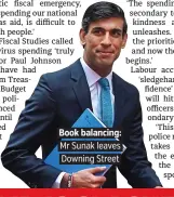  ??  ?? Book balancing: Mr Sunak leaves Downing Street